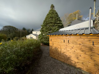 The Elegant Hyde Showing Subtle Restraint and Blending Beautifully into the Walled Garden