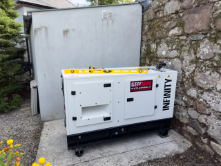 The Generator Set on a Solid Concrete Base in the Walled Garden