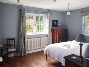 Room 5: Super king bed, genuine antiques, real wood flooring